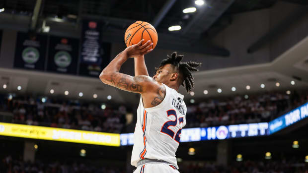 Allen Flanigan shoots a three.